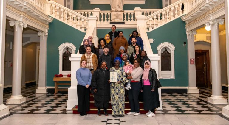 Image of a knife amnesty bin with two yellow arrows pointing to the opening of the bin. Sticker on the bin reading find out where to get help and support. Live your life, drop the knife' and a QR code.